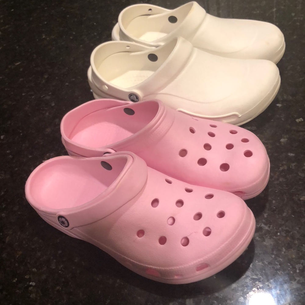 Crocs and pink sandals